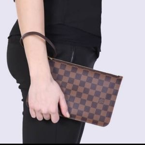 Authentic Louis Vuitton wristlet pouch- Like new